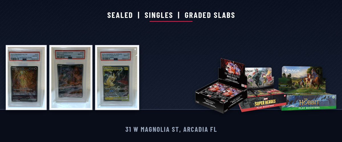 Real photos of three PSA 10 Pokemon slabs and One Piece OP-16, Marvel Super Heroes and The Hobbit booster boxes on a dark shelf